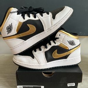 Air Jordan Mids size 5youth, black white and gold